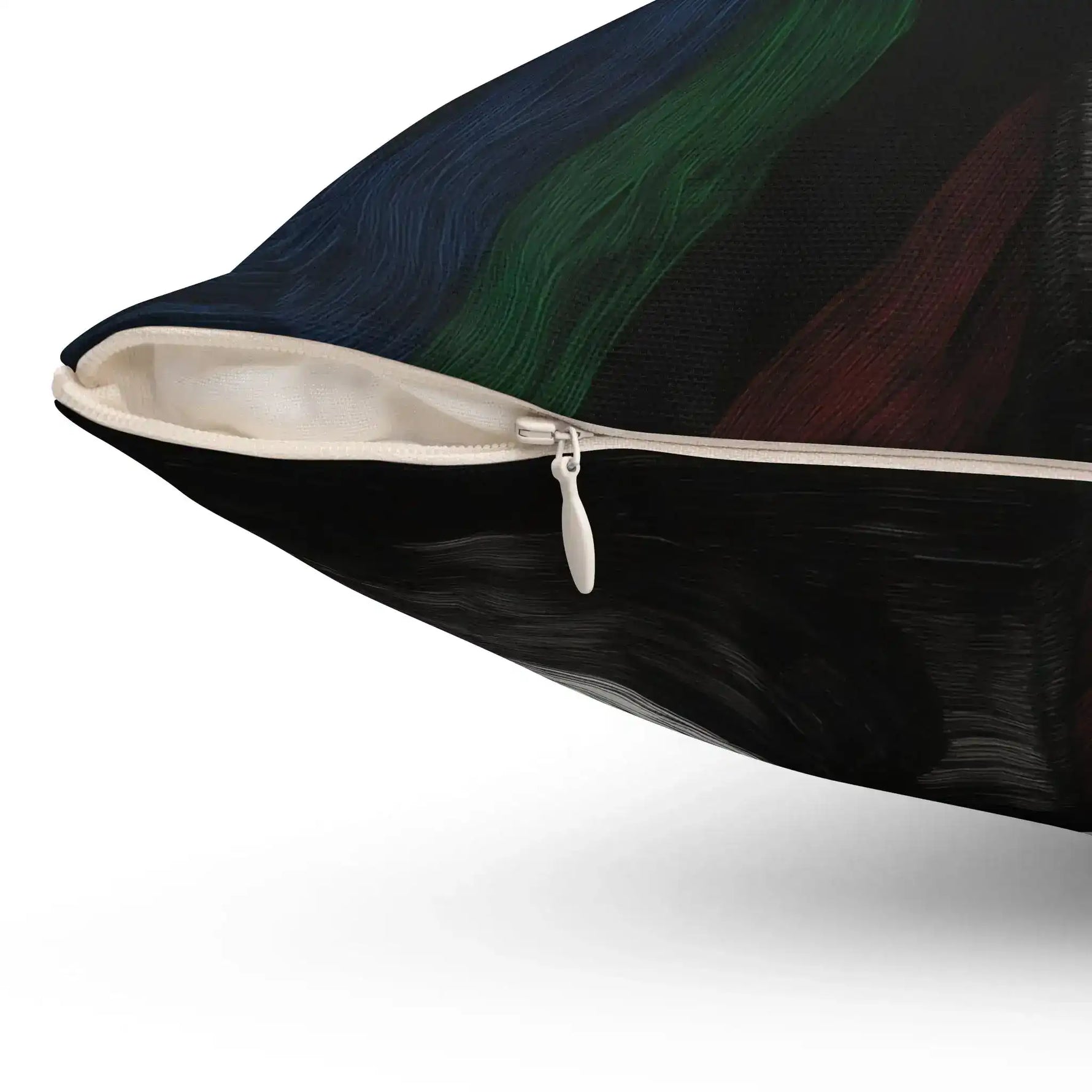 Corner zipper detail of Vibe Split Throw Pillow showing dark navy blue abstract striped canvas texture with green and red brushwork and cream zipper trim