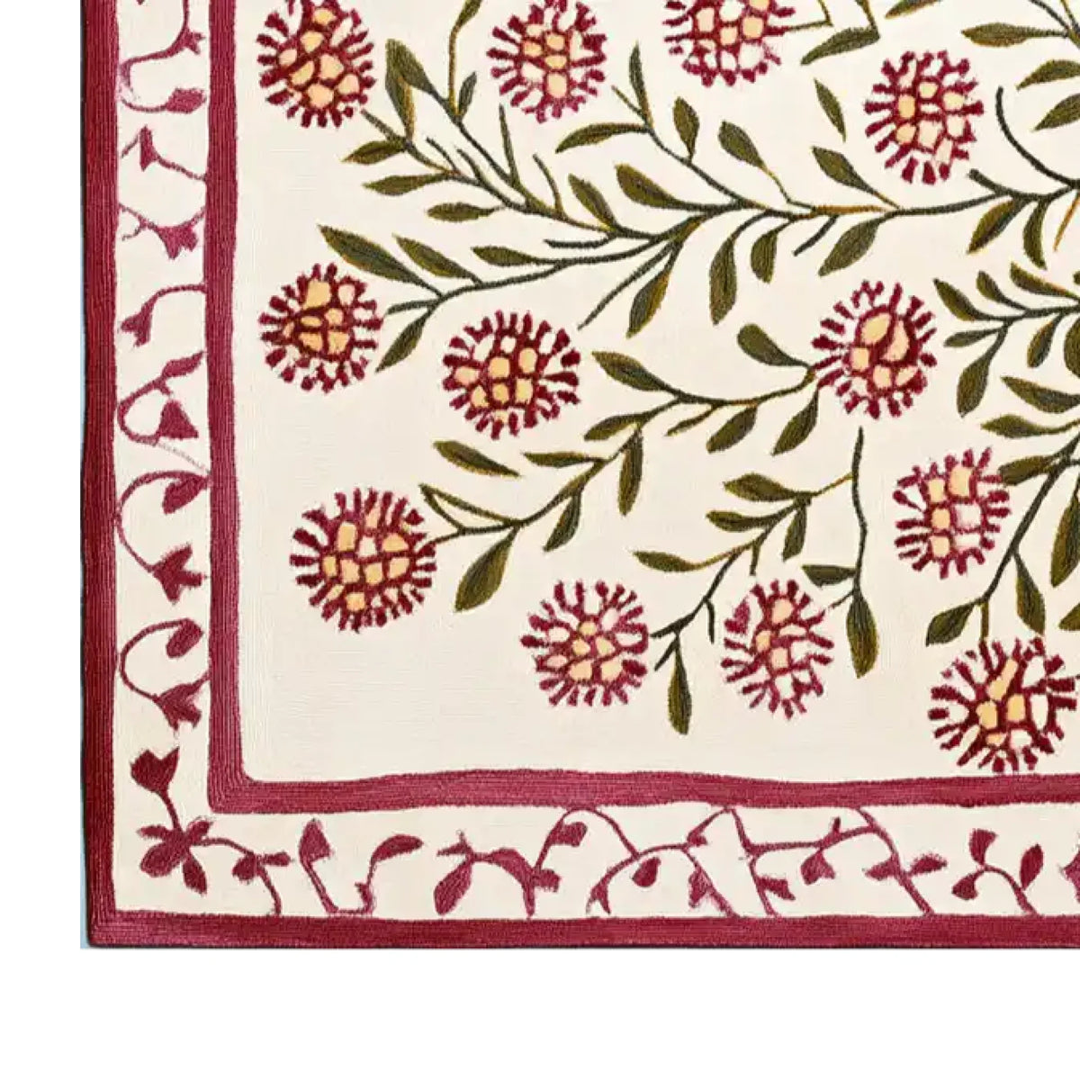 Close-up view of a vibrant, hand-tufted wool area rug, featuring a contemporary floral design with red and green patterns. Perfect for large living rooms, this 8x10 rug adds a stylish touch to any space.