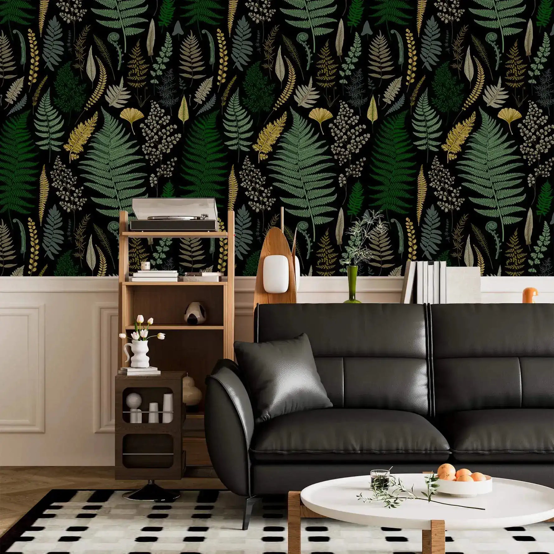 Vibrant fern canopy wallpaper above white wainscot with black leather sofa and ladder shelf