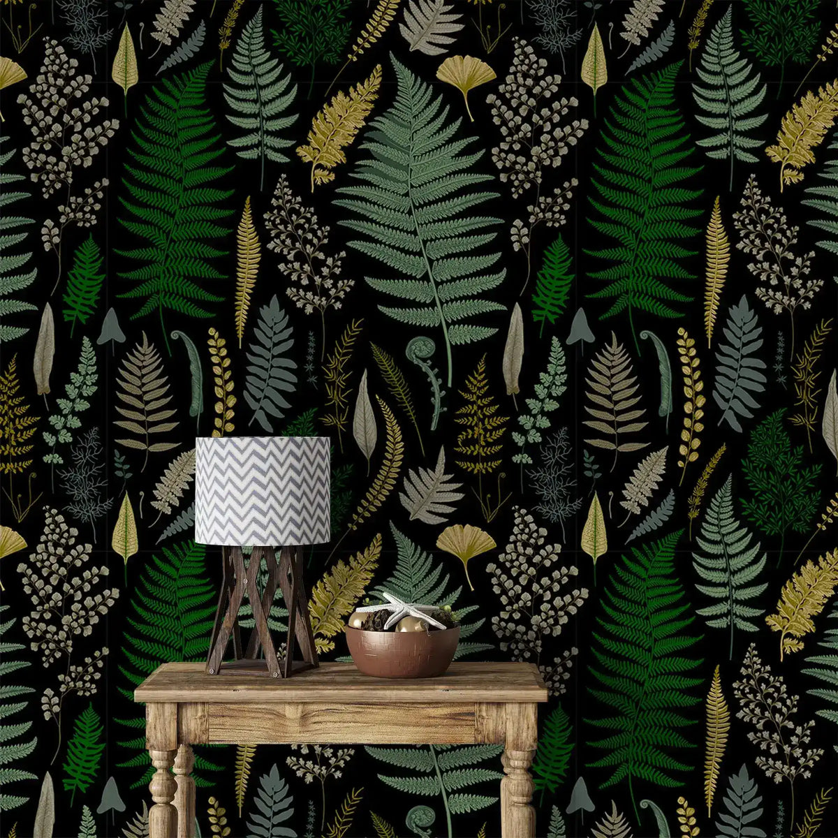 Vibrant fern canopy wallpaper, green ferns and ginkgo on black with rustic console table and lamp