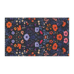 Vibrant Floral Embroidered Cotton Kitchen Towel flat landscape view with orange, lavender and pink flowers on deep navy ground