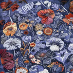 A vibrant floral medley hand-tufted area rug, perfect for large living rooms. This wool rug showcases a stunning array of colorful flowers against a rich blue background, creating an eye-catching floral rug design. Ideal for adding elegance and warmth to your living room area rugs collection.