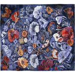 This vibrant floral medley hand-tufted area rug is perfect for a large living room. The wool rug features an array of colorful flowers in deep blues, reds, and oranges, creating a stunning floral rug that adds elegance to any living room area.