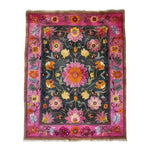 A vibrant floral area rug featuring a colorful tapestry design with bold pink, orange, and yellow flowers on a dark background. This large living room wool rug, reminiscent of Persian rugs, showcases a vintage charm perfect for an 8x10 space. Ideal for adding a touch of elegance to any living room.