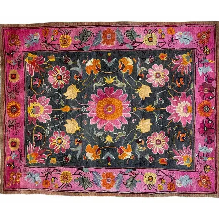 This vibrant floral tapestry area rug is a stunning piece for any large living room. The hand-knotted wool rug features a beautiful Persian-inspired design with rich, colorful flowers in shades of pink, yellow, and orange against a dark background. Perfect for adding a touch of vintage elegance, this 8x10 floral rug is a luxurious addition to any living space.