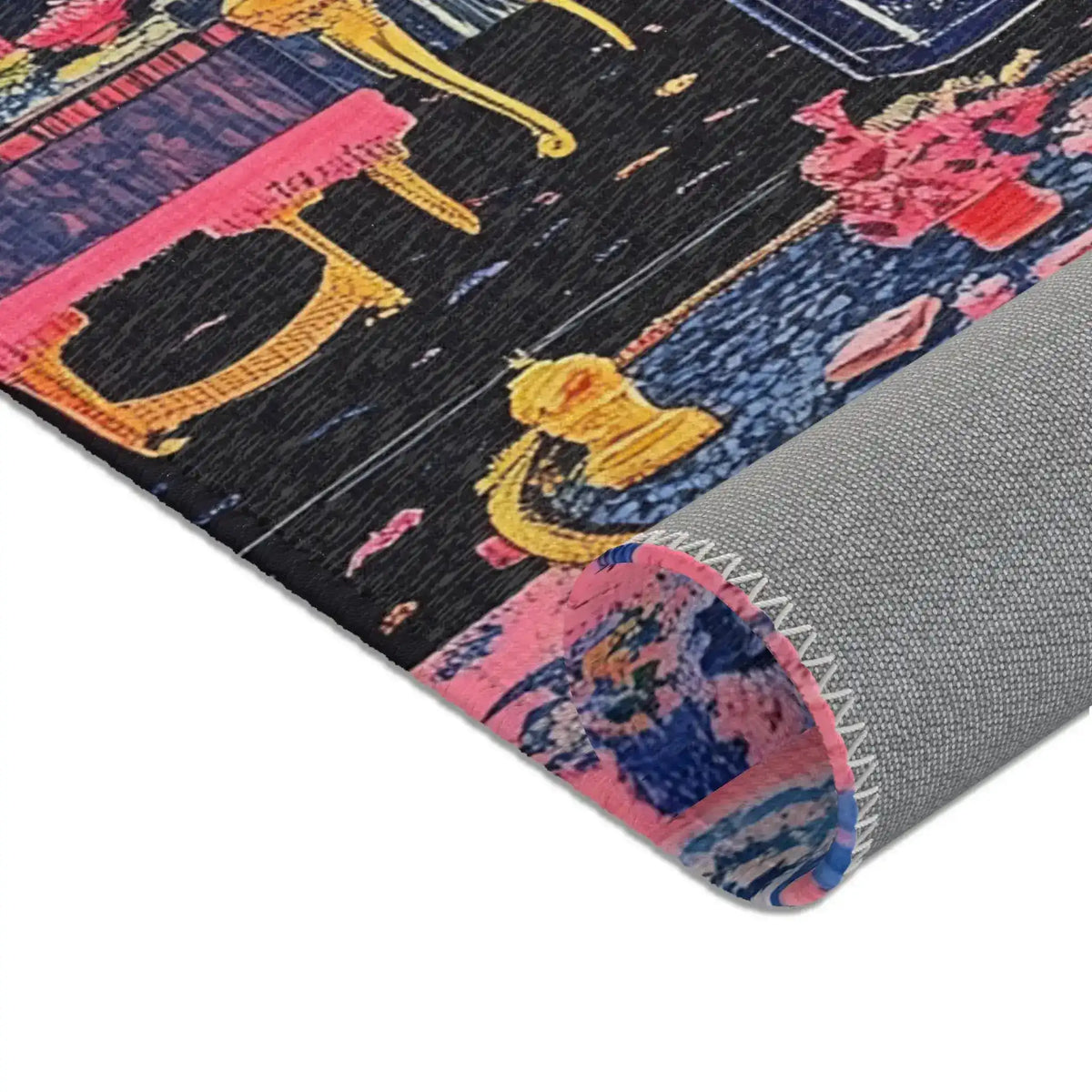 Folded corner of the Vibrant Maximalist Floral Rug with pink floral field and gold-framed coffee table base visible in background