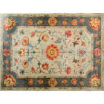 This vibrant modernity hand knotted area rug showcases a stunning Persian-inspired design with intricate floral patterns. The rug, perfect for large living rooms, features a harmonious blend of rich colors and detailed motifs, making it an ideal choice for those seeking elegant living room rugs in an 8x10 size.