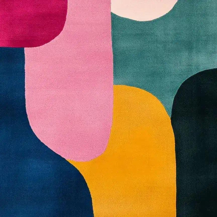 Vibrant Mosaic Pattern Hand Tufted Wool Rug featuring an abstract design with bold colors like pink, teal, and mustard. Perfect contemporary area rug for dining rooms and living rooms, adding a modern touch to your space.