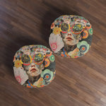 Pair of Vibrant Psychedelic Portrait Floor Pillows on wood floor seen from overhead with vivid floral collage art faces and multicolor patterned fabric