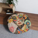 Vibrant Psychedelic Portrait Floor Pillow resting on wood floor near a wooden shelf, side-angle showing round shape and psychedelic collage print