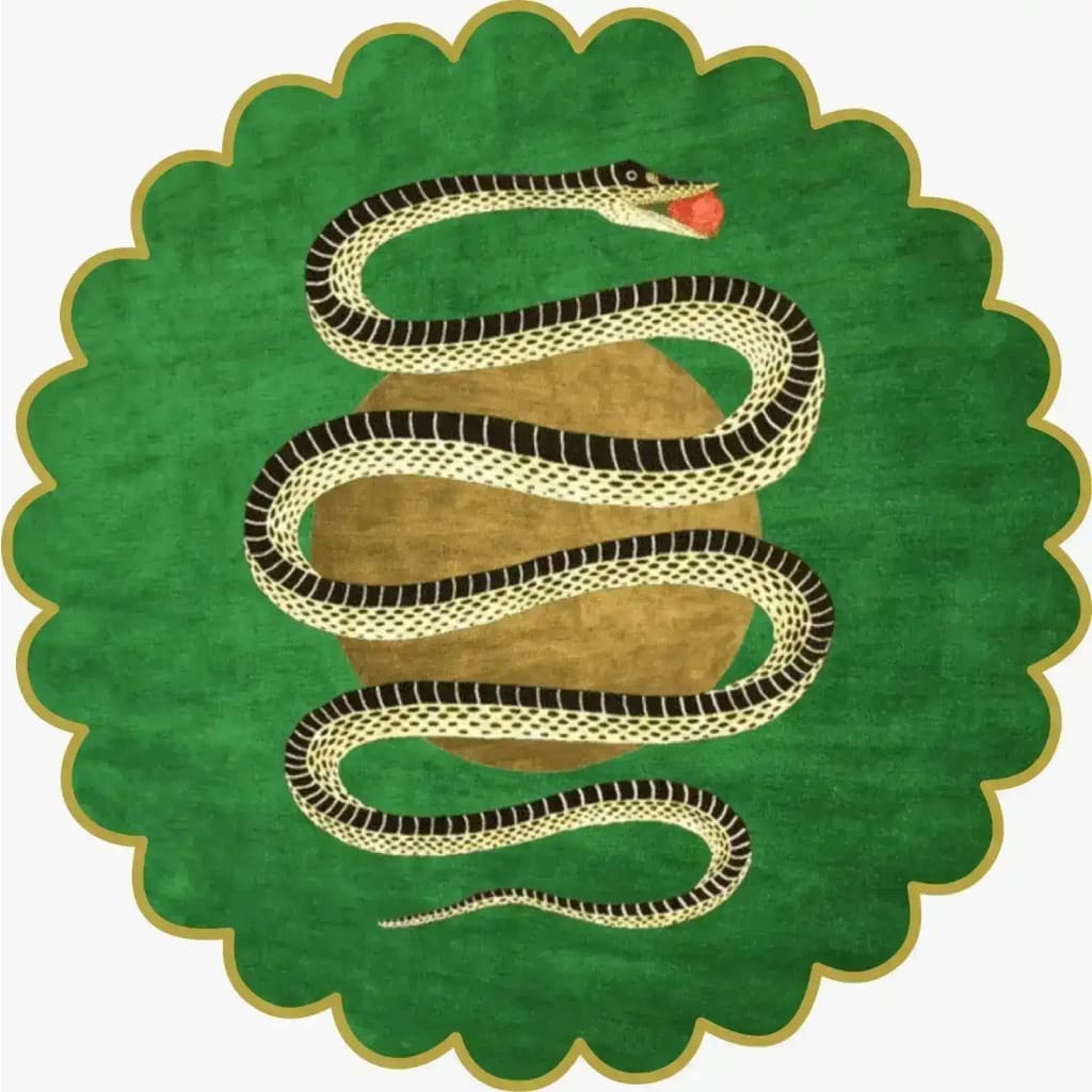 Vibrant round area rug featuring a striking design of a black and white snake entwined around a golden apple on a lush green background. The scalloped edges add a unique touch to this hand-tufted wool rug, making it a standout piece for large living rooms.