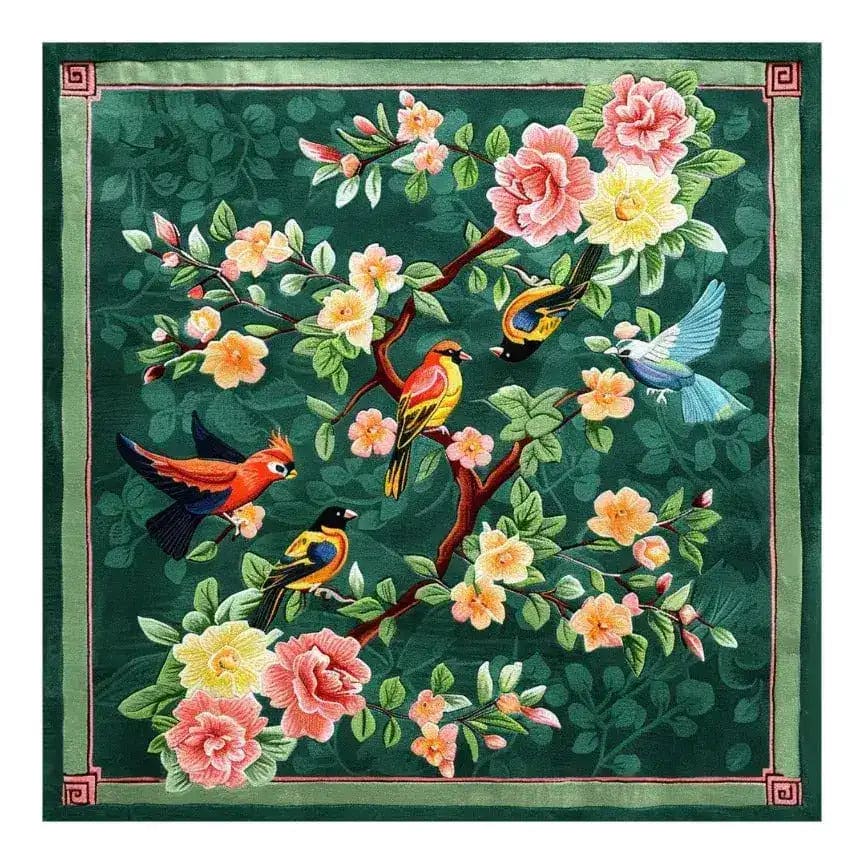 Vibrant Vintage Hand Tufted Area Rug featuring a lush floral design with colorful birds, perfect for adding charm to a living room. This wool square rug showcases a rich green background with detailed pink and yellow blossoms, making it an ideal large area rug for living rooms seeking a touch of nature.