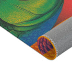 Corner fold of the Vibrant Vision Surreal Girl & Multicolor Fish Art rug curled back showing green fish scales on blue and grey non-slip backing