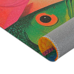 Extreme close-up of green fish eye with orange ring and pink red fish bodies on corner of the Vibrant Vision Surreal Girl & Multicolor Fish Art rug, grey backing