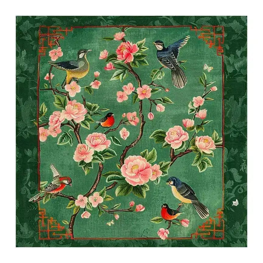 Vibrant Vortex Hand Tufted Area Rug featuring a lush floral design with birds, ideal for large living rooms. This square wool rug showcases a rich green background adorned with pink blossoms and detailed bird illustrations, perfect as an area rug for living rooms seeking a touch of nature-inspired elegance.