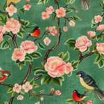 A vibrant hand-tufted area rug featuring a lush floral design with pink blossoms and colorful birds on a green background. Ideal for large living rooms, this wool square area rug adds a touch of nature and elegance to your space.