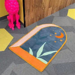 A uniquely designed hand-tufted area rug featuring a dark night theme, perfect for large living room spaces. The rug showcases an abstract night sky with a crescent moon and stars, adding a whimsical touch to any decor. Its wool construction ensures durability and comfort, making it an ideal choice for living room rugs sized 8x10.