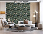 Vine and flower wallpaper as feature wall in luxury living room with cream curved sofa and gold ring chandelier