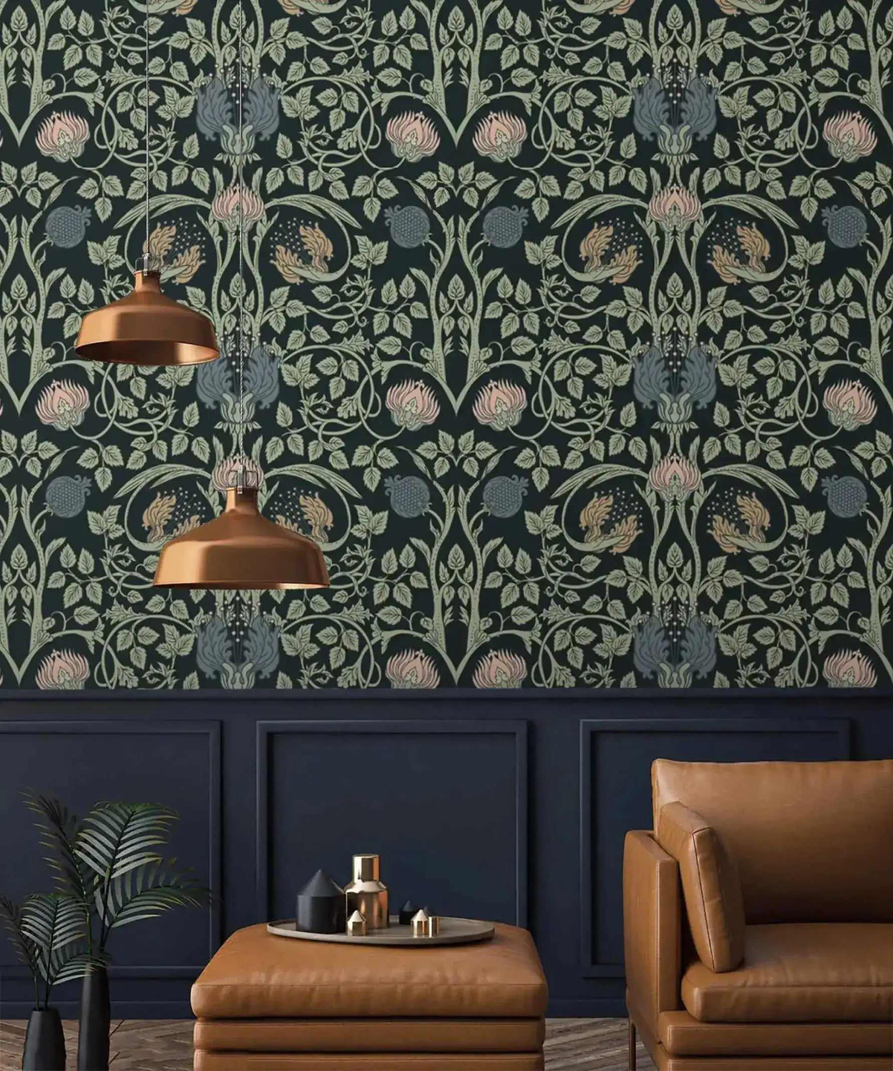 Vine and flower wallpaper above dark navy molding panels with tan leather armchair and twin copper pendant lights