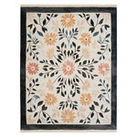 Beautiful area rug showcasing a floral design with intricate patterns in warm tones, perfect for enhancing living room decor. This hand-tufted wool rug measures 8x10, offering a cozy and stylish addition to any home.
