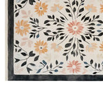 Vibrant hand tufted wool rug featuring a floral design with colorful flowers and black leaves, perfect for adding charm to living room spaces. Ideal as a living room area rug, this 8x10 wool rug enhances any home decor with its elegant pattern.