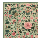 Close-up view of the Vinework Blossom Field Hand Tufted Rug, showcasing a vibrant floral design. This wool area rug features intricate pink and green blossoms, perfect as a square area rug for living rooms, adding a fresh floral touch to any space.