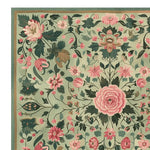 Close-up view of the Vinework Blossom Field Hand Tufted Rug, showcasing a vibrant floral design. This wool area rug features intricate pink and green blossoms, perfect as a square area rug for living rooms, adding a fresh floral touch to any space.