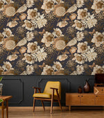 Vintage bird garden wallpaper in sepia florals on dark navy, styled above wainscoting with yellow chair