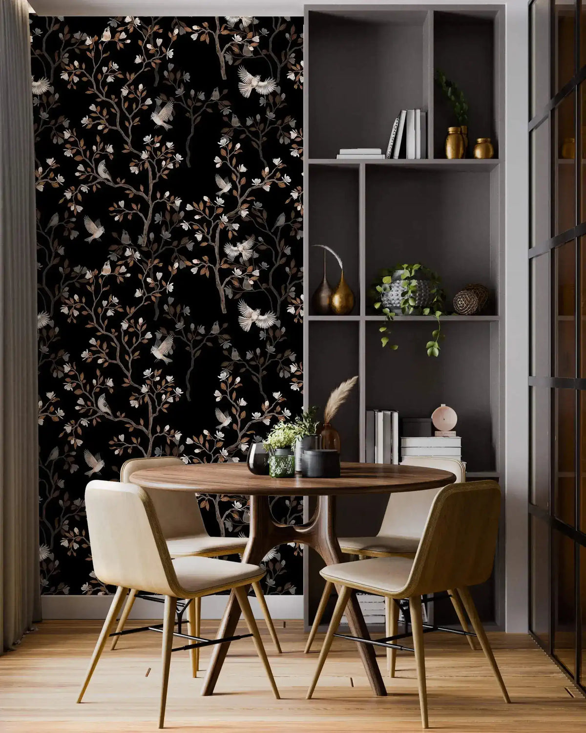 Vintage bird haven wallpaper with birds and blossoms on black in a dining nook with a round wood table