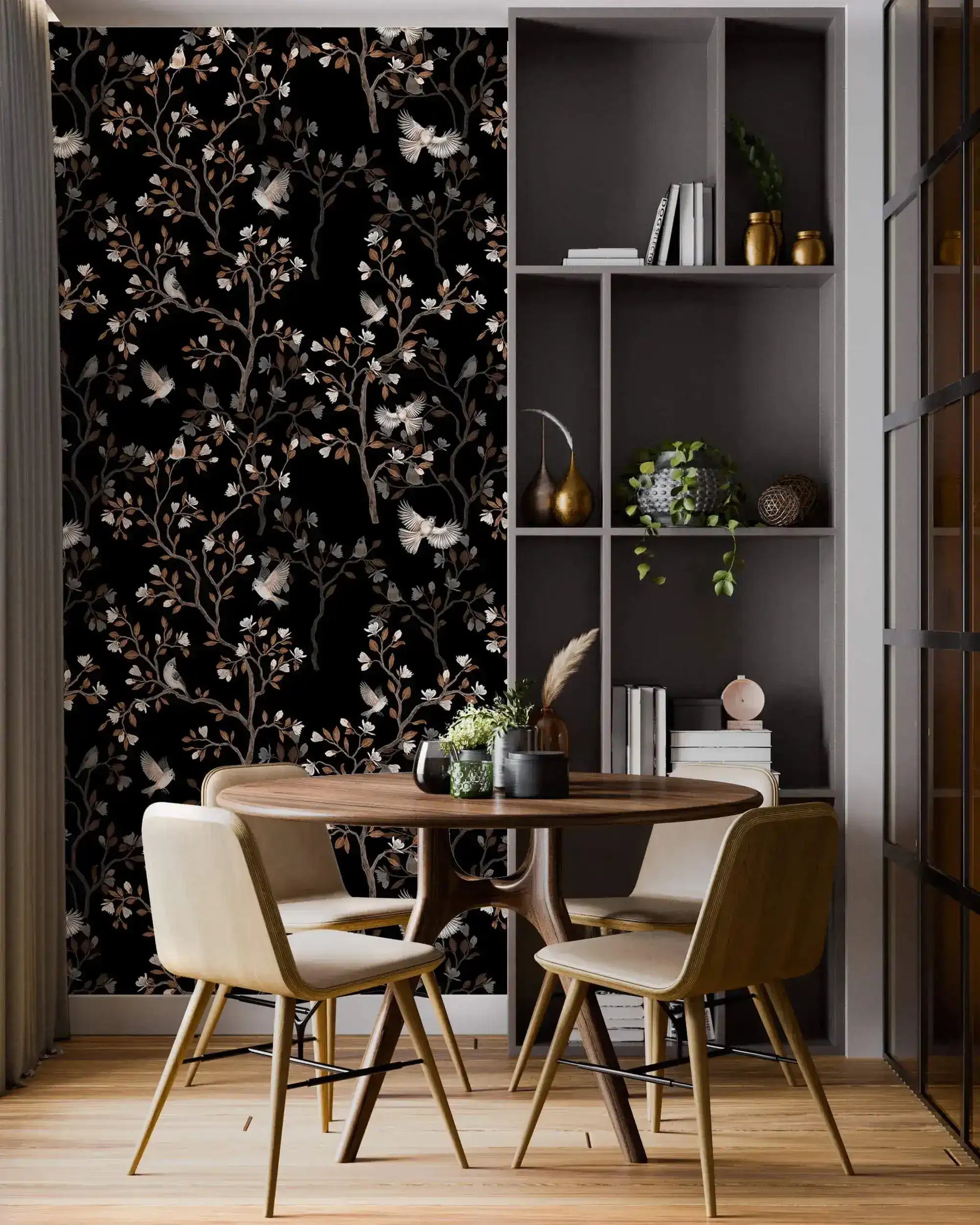 Vintage bird haven wallpaper with birds and blossoms on black in a dining nook with a round wood table