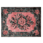 This vintage blushed bloom hand tufted area rug showcases an elegant floral design with intricate pink and green hues, perfect for enhancing living room decor. Ideal for those seeking vintage rugs or wool rugs for a cozy and stylish touch.