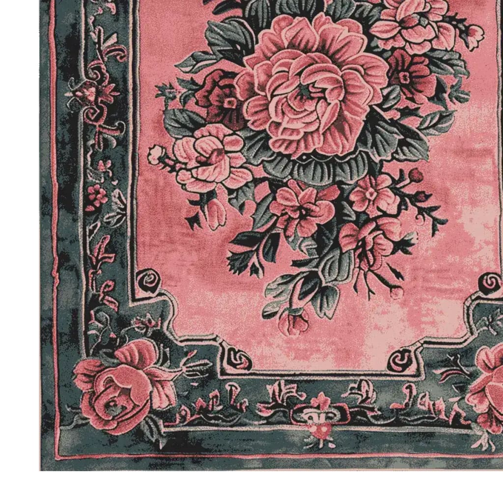 A beautifully detailed vintage blushed bloom hand tufted area rug, perfect for adding elegance to living room spaces. This wool rug features a vibrant floral design with intricate patterns, making it an ideal choice for those seeking vintage rugs for living rooms.