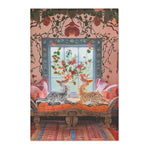 Vintage Bohemian Woven Rug in a boho sitting room with two cats on a carved bench, orange-red stripe-geometric pattern on the floor
