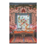 Vintage Bohemian Woven Rug styled in a pink-walled bohemian room, two cats on carved wooden bench, colorful orange-blue stripe pattern on floor