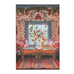 Full scene of Vintage Bohemian Woven Rug on floor of boho room, striped orange-blue geometric weave, cats resting on carved bench by window
