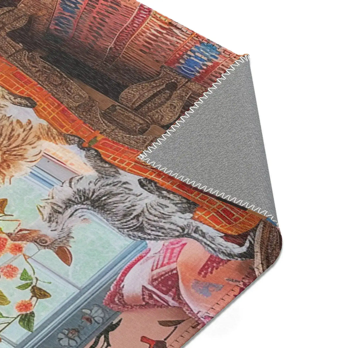 Corner fold of the Vintage Bohemian Woven Rug showing grey backing, orange-rust stripe face pattern and carved bench leg detail above