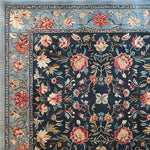 This vintage charm hand tufted area rug features a stunning floral design with vibrant colors set against a dark background, perfect for enhancing the aesthetic of your dining room or living room. The wool material and intricate patterns make it a standout piece among dining room area rugs, adding a touch of elegance and warmth.
