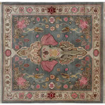 A beautifully handcrafted vintage elephant-themed area rug, perfect for large living rooms. This Persian-style wool rug features intricate designs with a central elephant motif, surrounded by floral patterns. Ideal as a square area rug or living room rug 8x10, it adds a touch of elegance and timeless charm to any space.