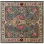 A beautifully handcrafted vintage elephant-themed area rug, perfect for large living rooms. This Persian-style wool rug features intricate designs with a central elephant motif, surrounded by floral patterns. Ideal as a square area rug or living room rug 8x10, it adds a touch of elegance and timeless charm to any space.