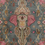 A beautifully detailed Vintage Elephant Hand Knotted Area Rug, featuring an intricate design with a central elephant motif. This Persian wool rug, perfect for a large living room, showcases a rich blend of colors on a soft background, ideal as an 8x10 square area rug. The vintage charm of this piece adds elegance to any living space.