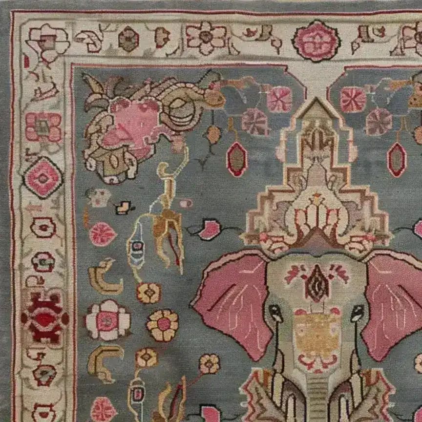 Close-up view of a Vintage Elephant Hand Knotted Area Rug featuring intricate designs with an elephant motif, floral patterns, and warm colors. Perfect for large living rooms, this Persian wool rug adds a touch of elegance and charm to any space. Ideal as a square rug for living room settings, fitting well as an 8x10 square area rug.