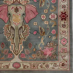 Close-up view of a Vintage Elephant Hand Knotted Area Rug, showcasing intricate design with a central elephant motif. This large wool rug features vibrant colors perfect for a living room, embodying the charm of Persian rugs. Ideal for those seeking a vintage square area rug or living room rugs 8x10.