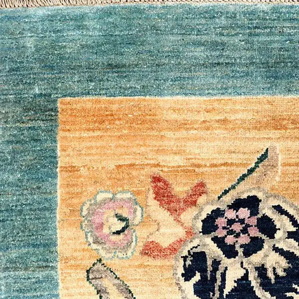 Close-up of a Vintage Floral Bordered Chinoiserie Blue Wool Hand Knotted Area Rug, showcasing intricate floral designs with vibrant colors, perfect for adding elegance to large living room rugs or living room area rugs.