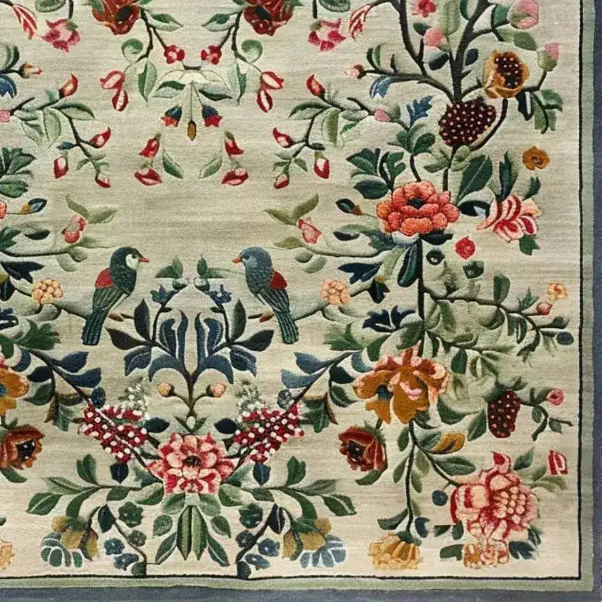 This vintage floral hand tufted area rug showcases an intricate design with vibrant flowers and birds, perfect for adding a touch of elegance to any living room or bedroom. Made from high-quality wool, this floral rug combines traditional craftsmanship with a timeless aesthetic, making it an ideal choice for those seeking stylish living room area rugs or rugs for the bedroom.
