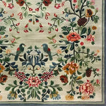 This vintage floral hand tufted area rug showcases an intricate design with vibrant flowers and birds, perfect for adding a touch of elegance to any living room or bedroom. Made from high-quality wool, this floral rug combines traditional craftsmanship with a timeless aesthetic, making it an ideal choice for those seeking stylish living room area rugs or rugs for the bedroom.