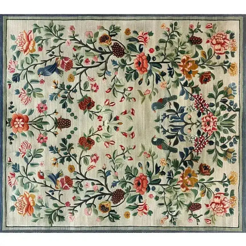 This image showcases a beautifully designed vintage floral hand-tufted area rug, perfect for adding elegance to your living room or bedroom. The wool rug features a vibrant array of intricate floral patterns, making it an ideal choice for those seeking vintage rugs or floral rugs for their space. Its detailed craftsmanship and rich colors make it a standout piece among living room area rugs.