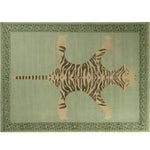 Vintage green hand-knotted wool rug featuring an abstract tiger design, perfect for adding a unique touch to bedroom or office spaces. The intricate patterns make this area rug a standout piece among bedroom area rugs.
