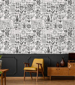 Vintage herbal alchemy wallpaper, black botanical and apothecary sketches on white, with mustard chair