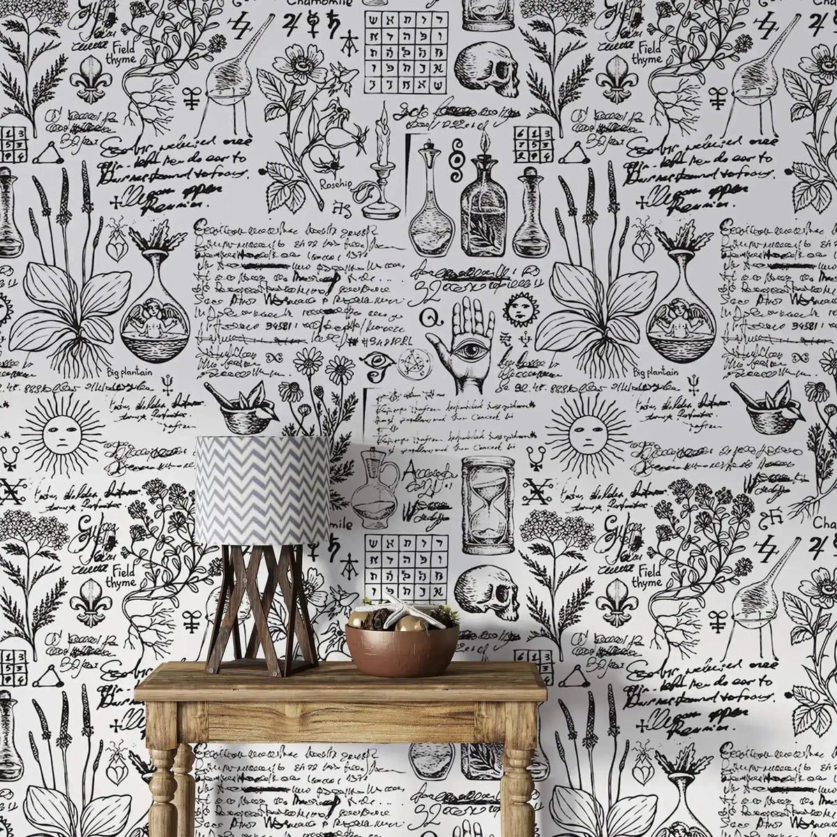 Vintage herbal alchemy wallpaper showing botanical sketches and script behind a rustic console with lamp