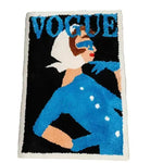 The Vintage Magazine Tufted Poster Rug is a bold and creative piece that brings a touch of nostalgia and modern flair to any space. Inspired by vintage magazine covers, this rug features vibrant colors and striking graphic designs, making it a unique statement piece. Hand-tufted with precision, it offers a soft, plush texture while ensuring durability and long-lasting quality. Ideal for adding personality and character to your living room, bedroom, or even a creative workspace, this rug combines art and fun